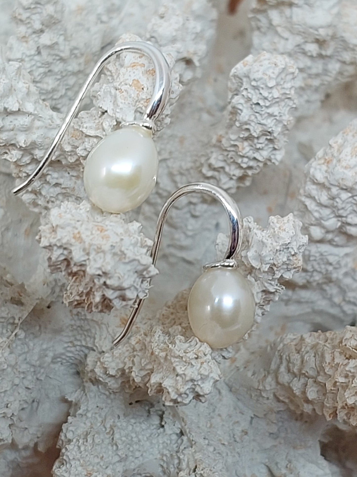 White pearl earrings